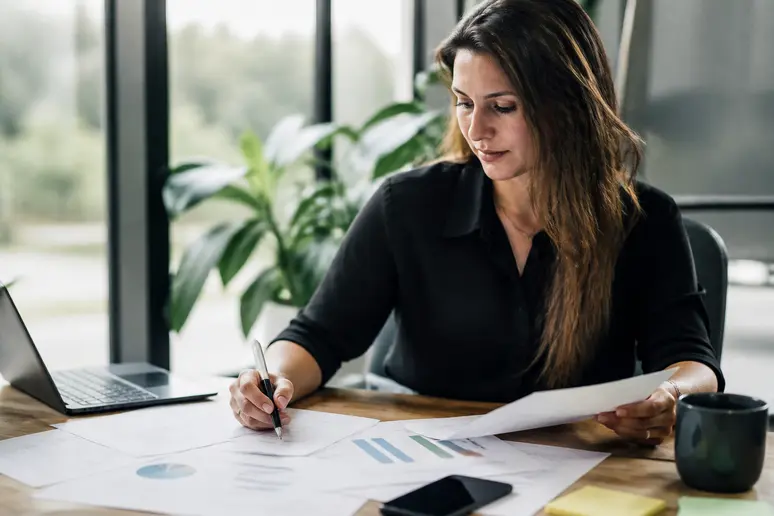 Strategist auditing B2B content marketing examples to remove structural errors